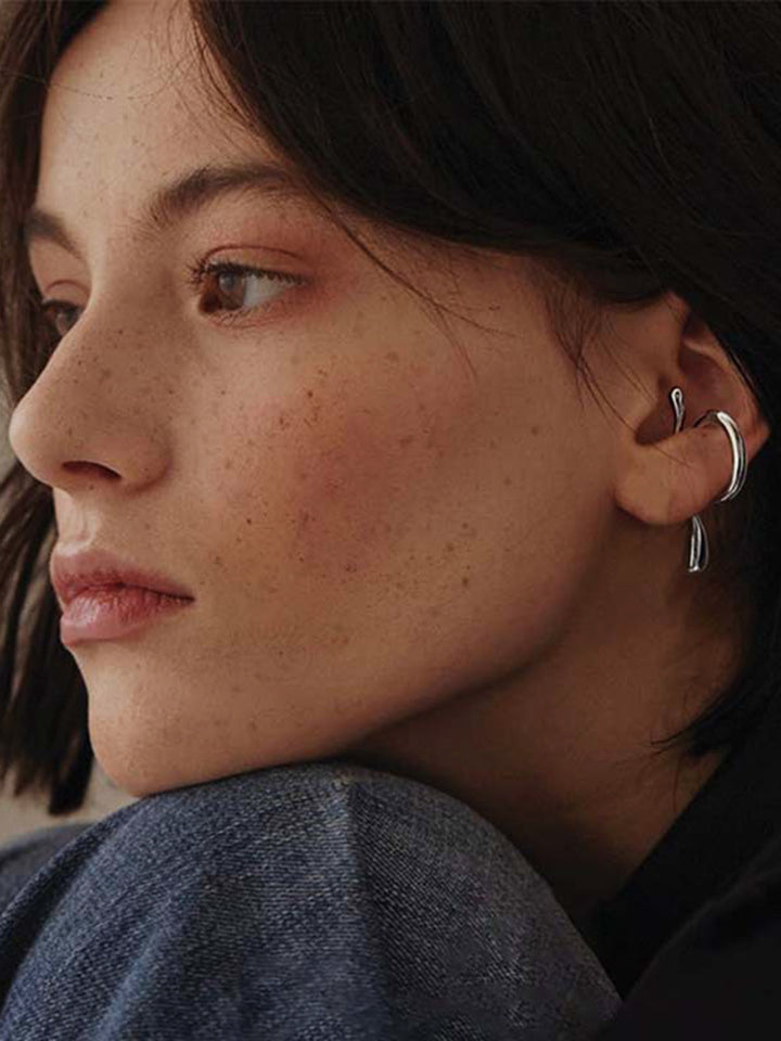 Boucle d'oreille manchette florale