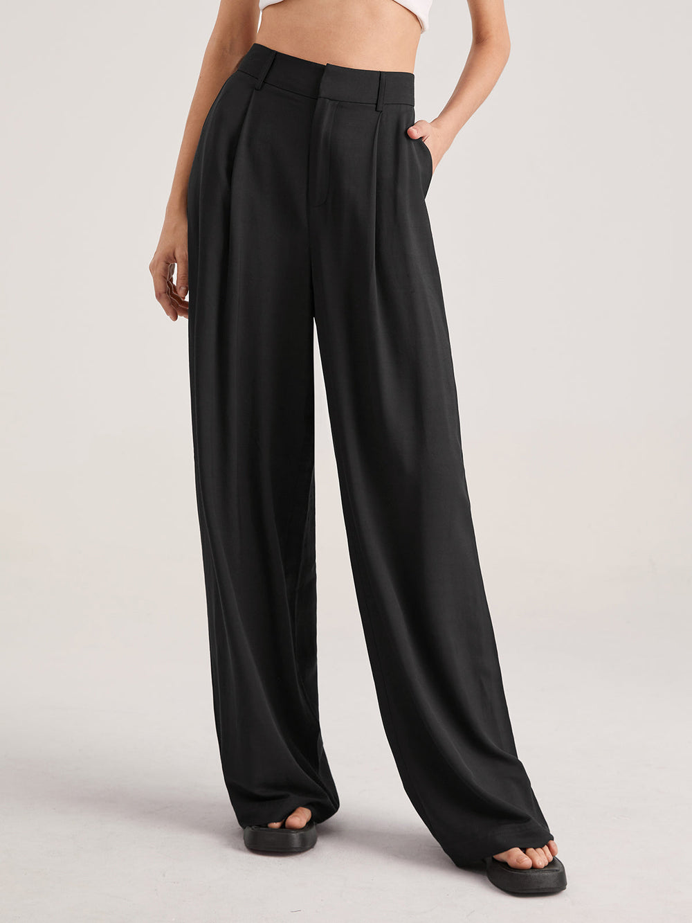 Pantalon ample taille haute plissé