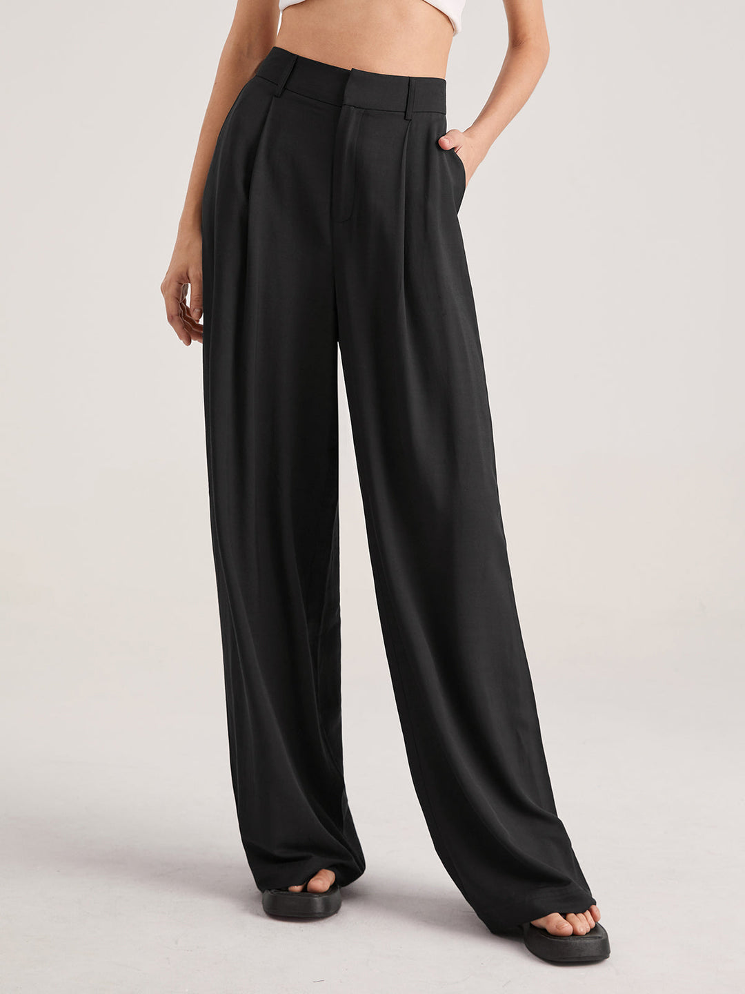 Pantalon ample taille haute plissé
