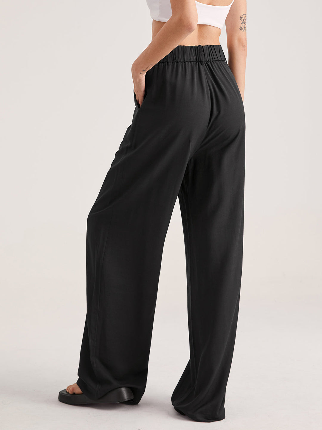 Pantalon ample taille haute plissé