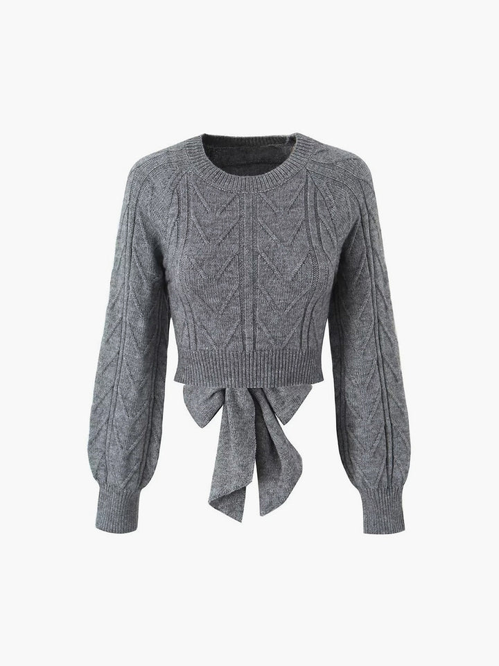 Pull en maille torsadée à nouer dans le dos
