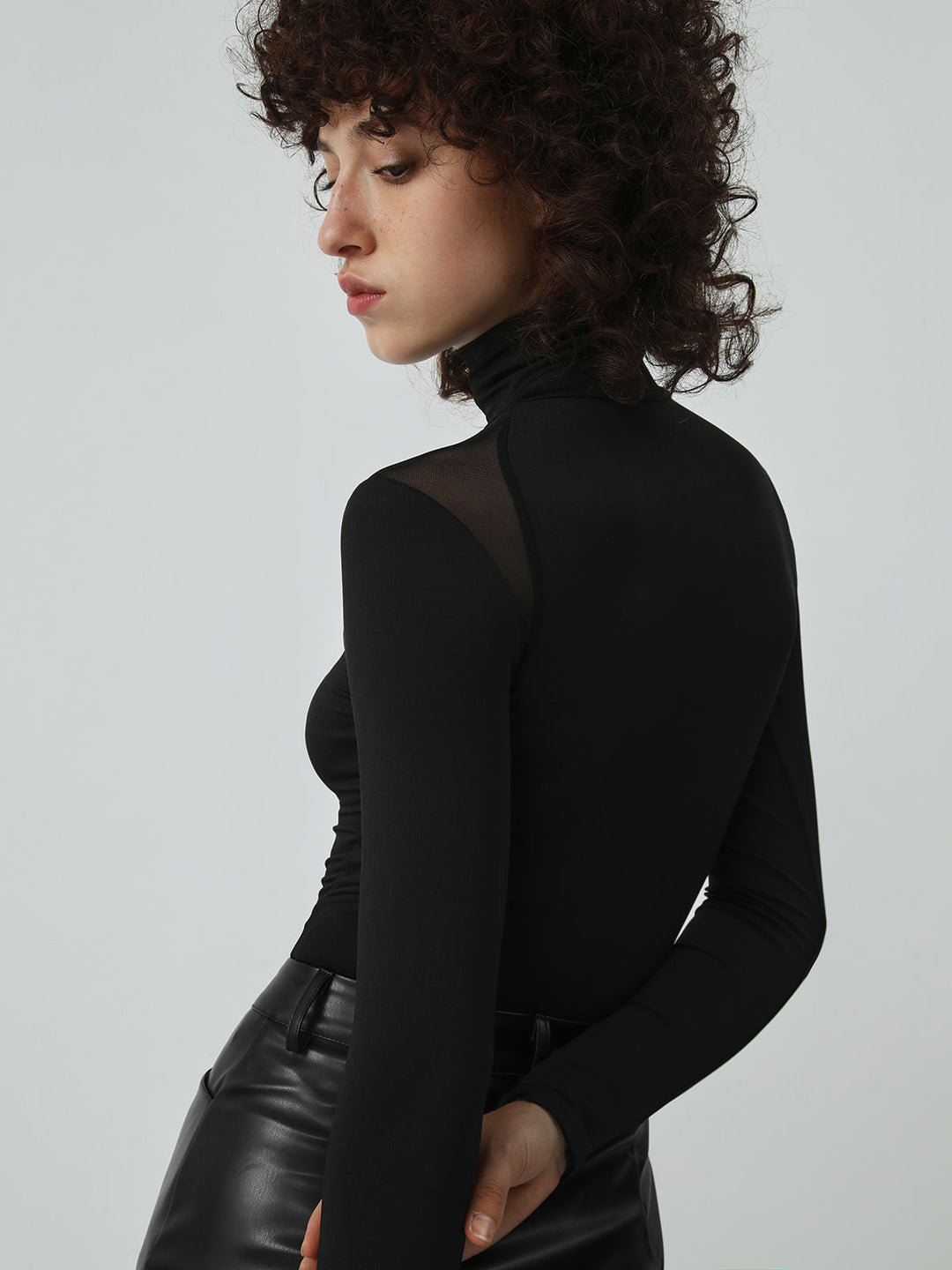 Bodysuit à col roulé en résille patchwork à manches longues