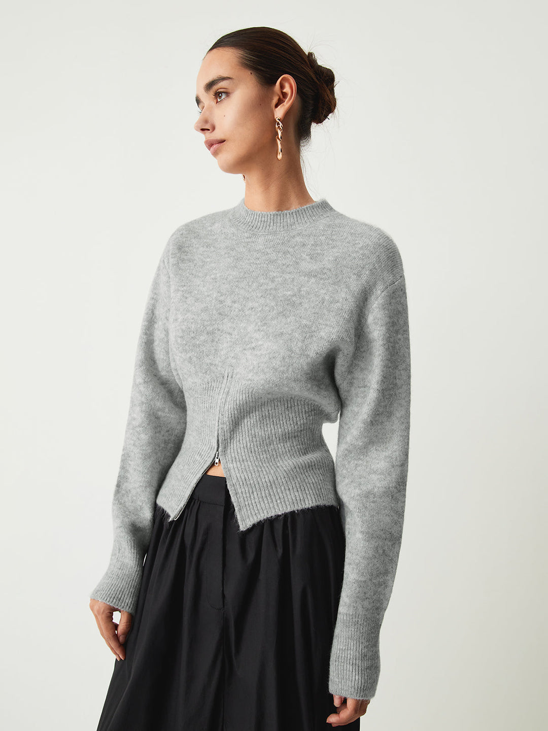 Pull col zippé flou