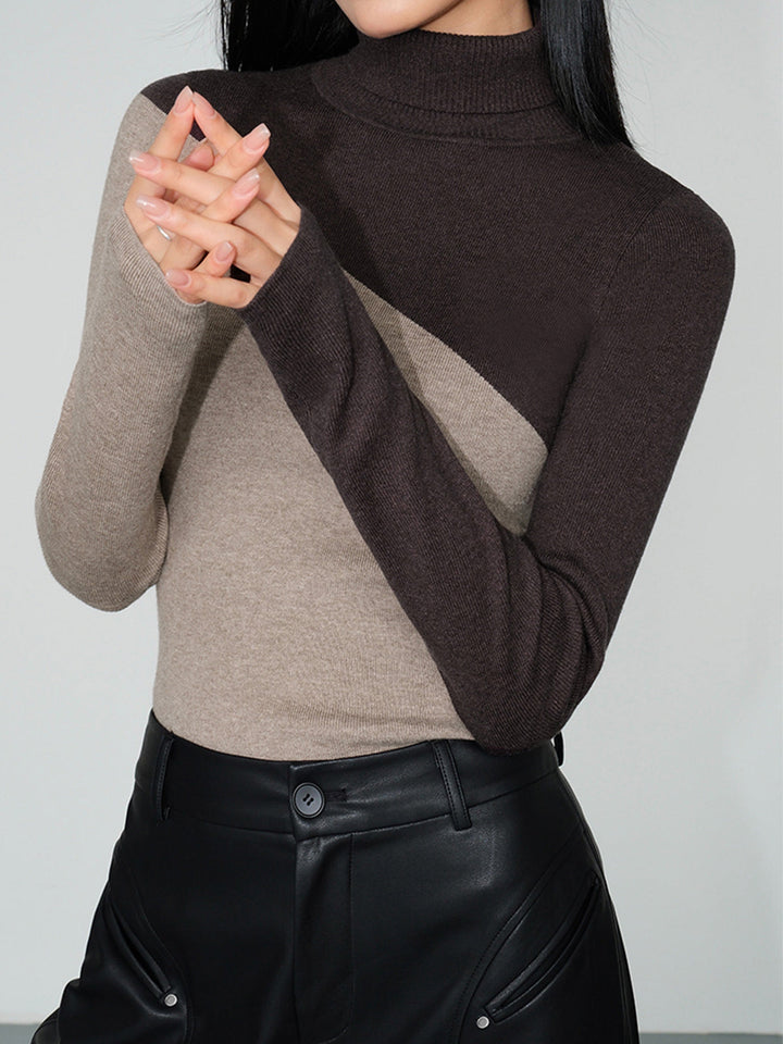 Haut en tricot à col montant à manches longues et patchwork asymétrique
