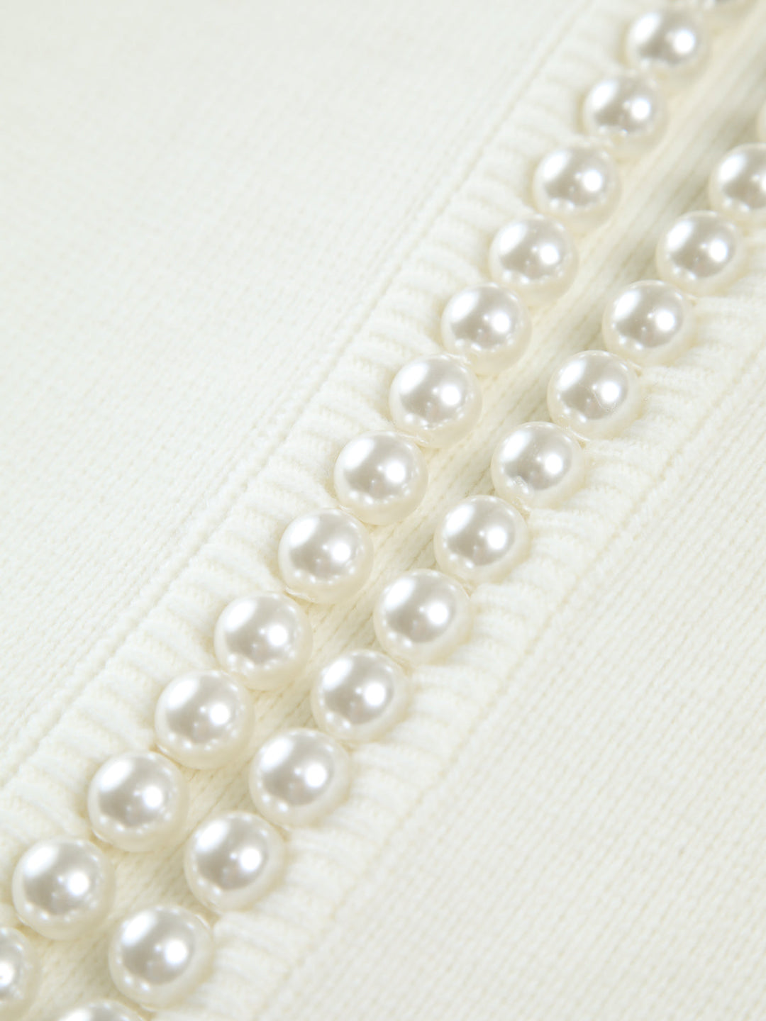 Cardigan à ourlet déchiré avec garniture en perles