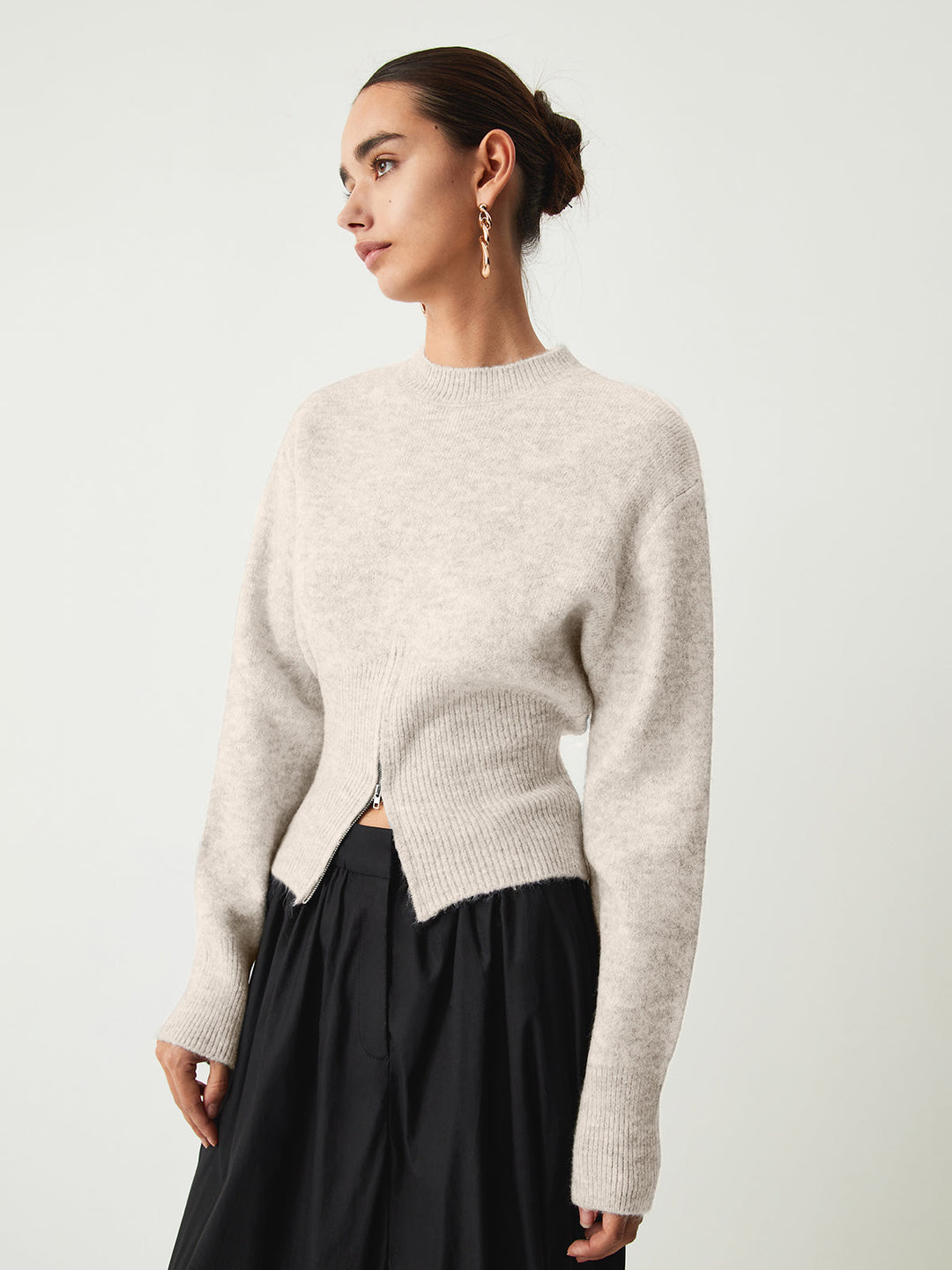 Pull col zippé flou