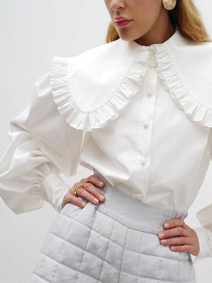 Chemise à manches longues avec col volanté