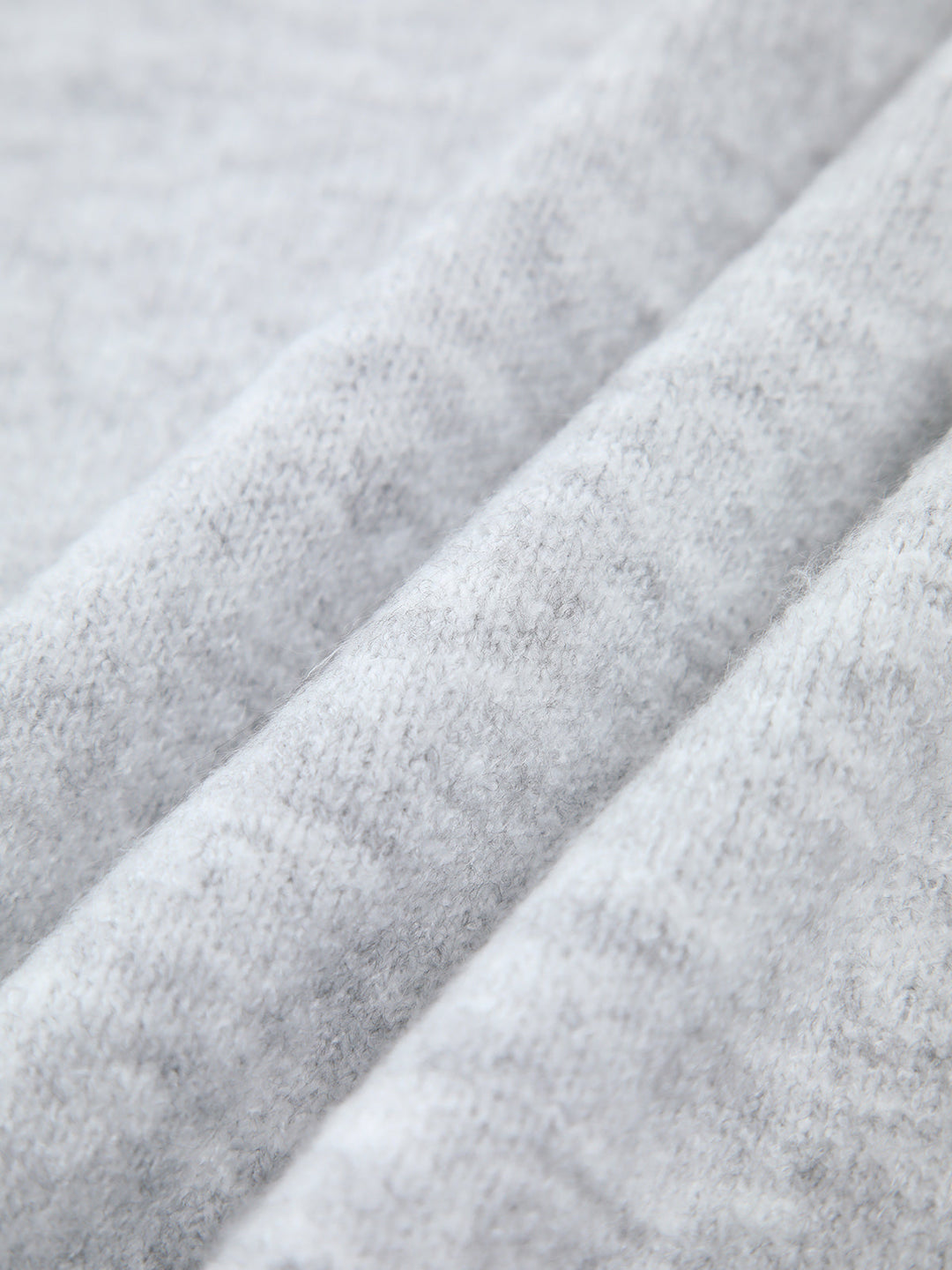 Pull à épaules dénudées asymétriques