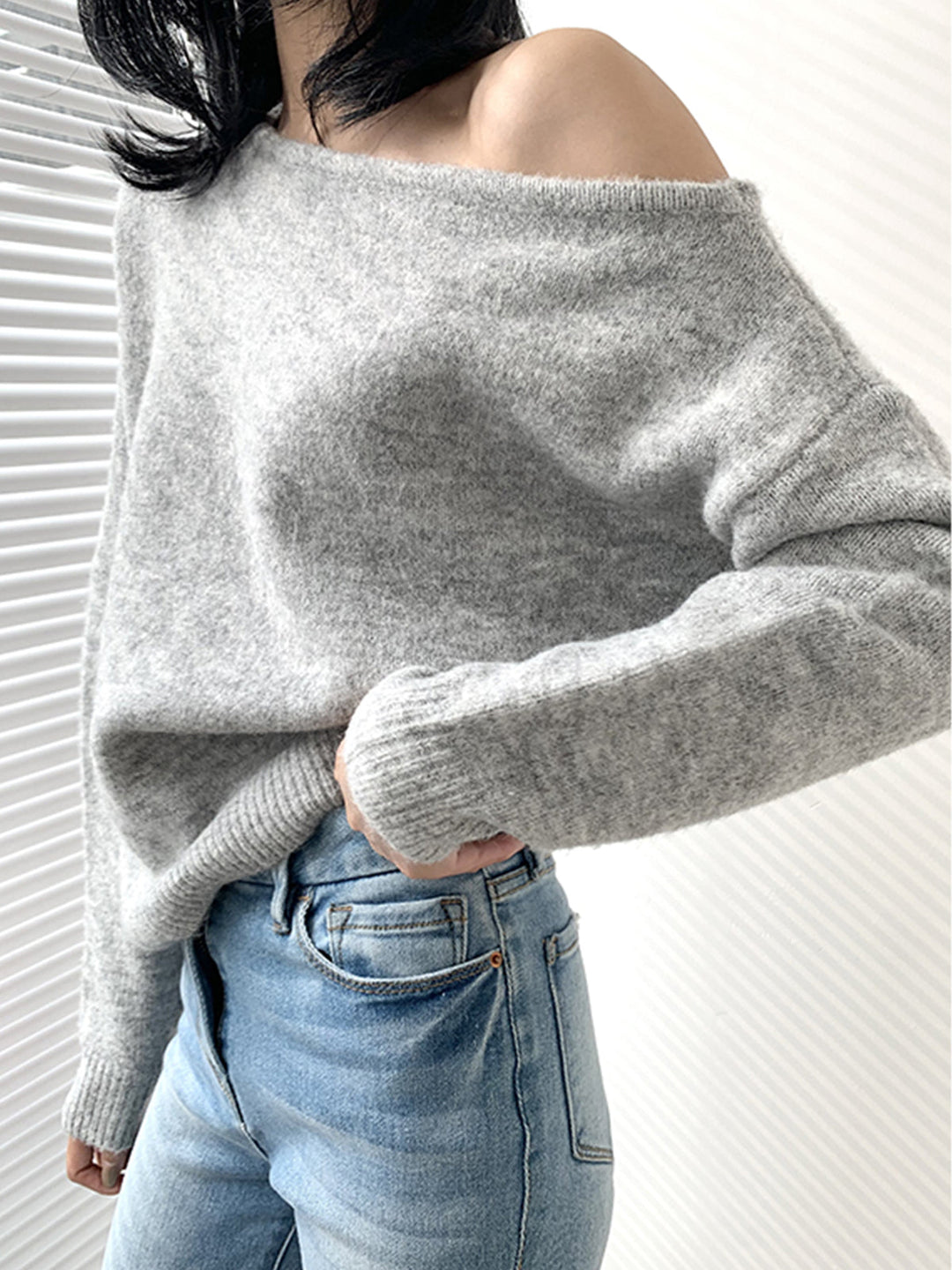 Pull à épaules dénudées asymétriques