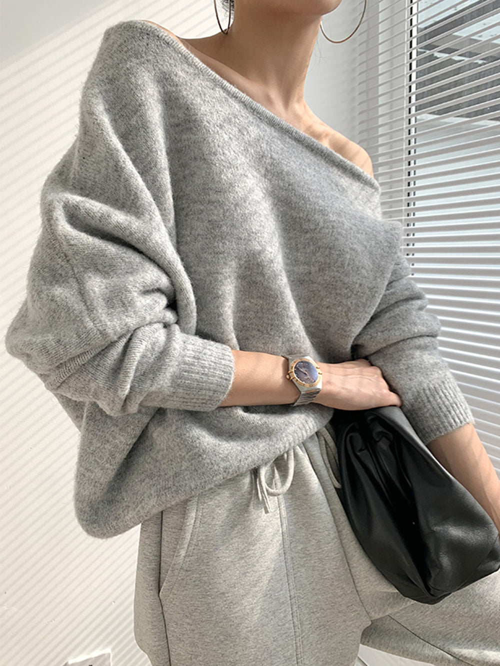 Pull à épaules dénudées asymétriques