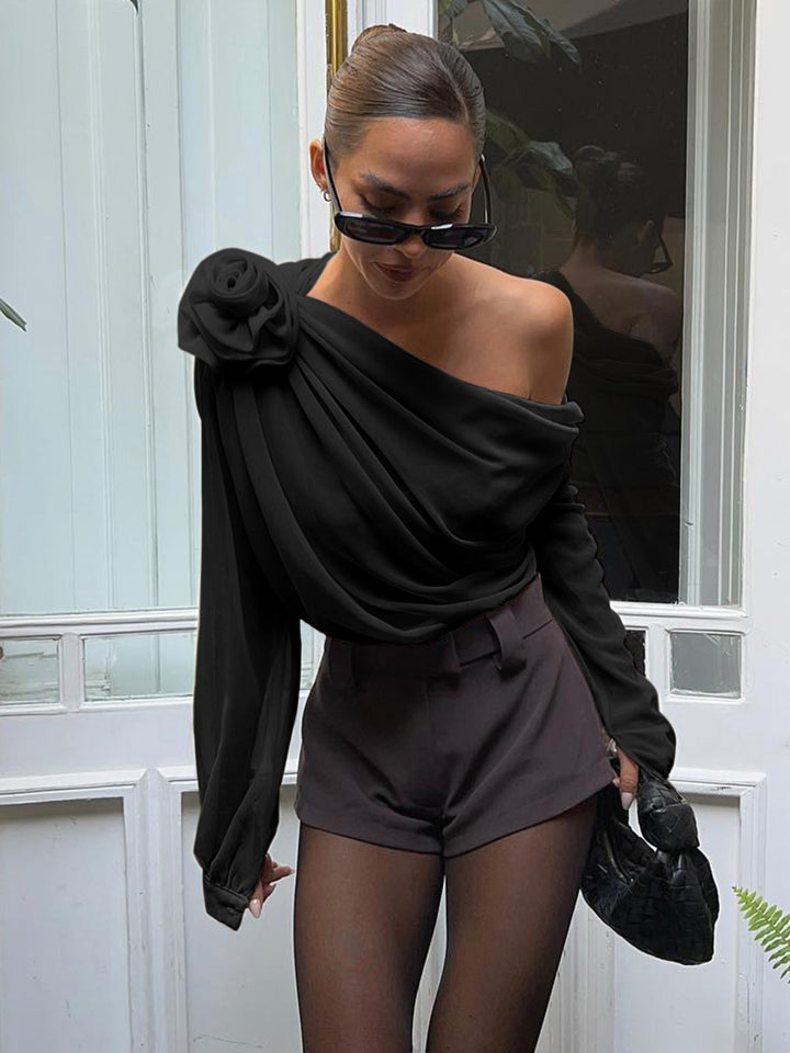 Blouse asymétrique à épaules dénudées en mousseline semi-transparente