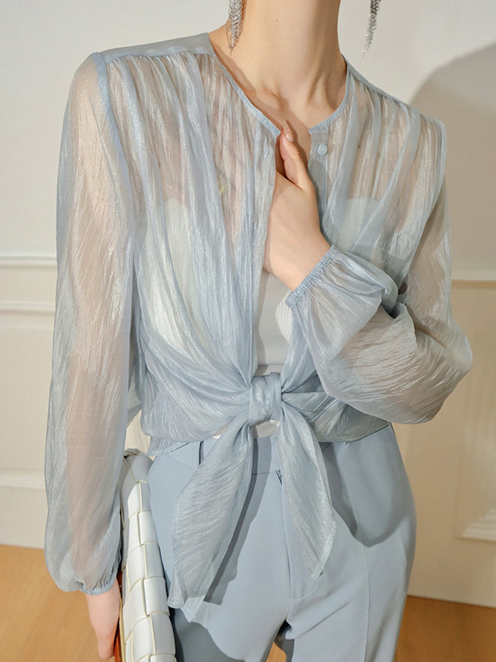 Blouse boutonnée à manches longues semi-transparente