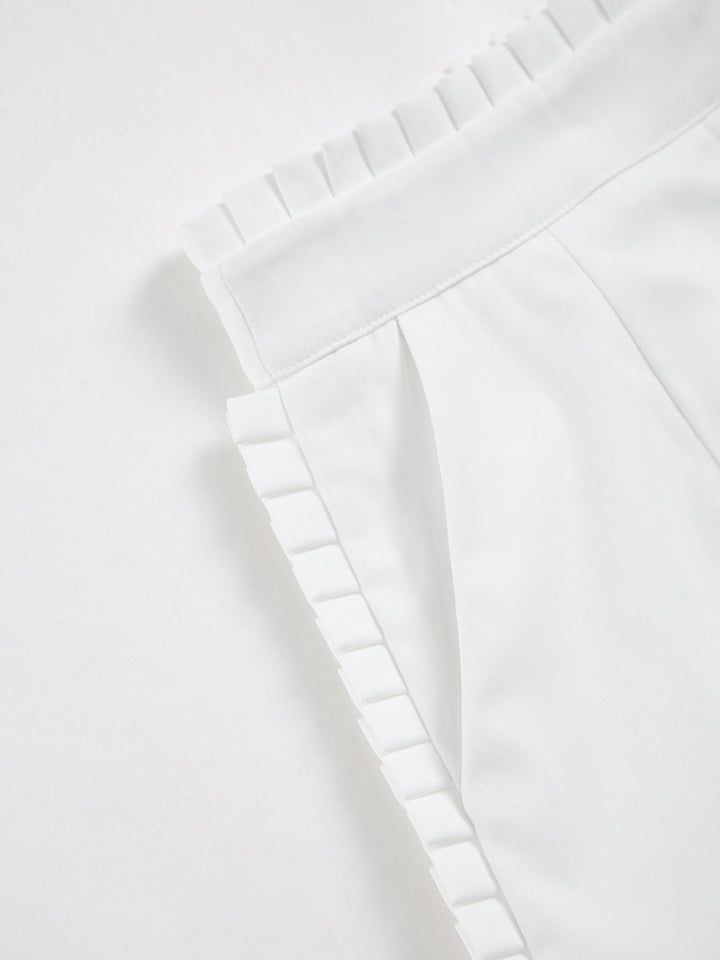 Shorts plissés à volants