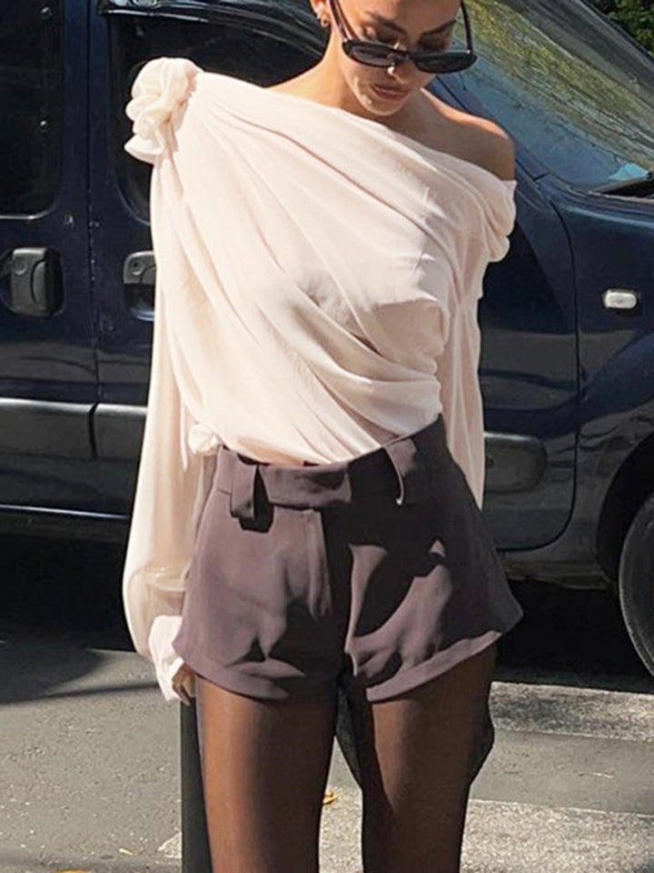 Blouse asymétrique à épaules dénudées en mousseline semi-transparente