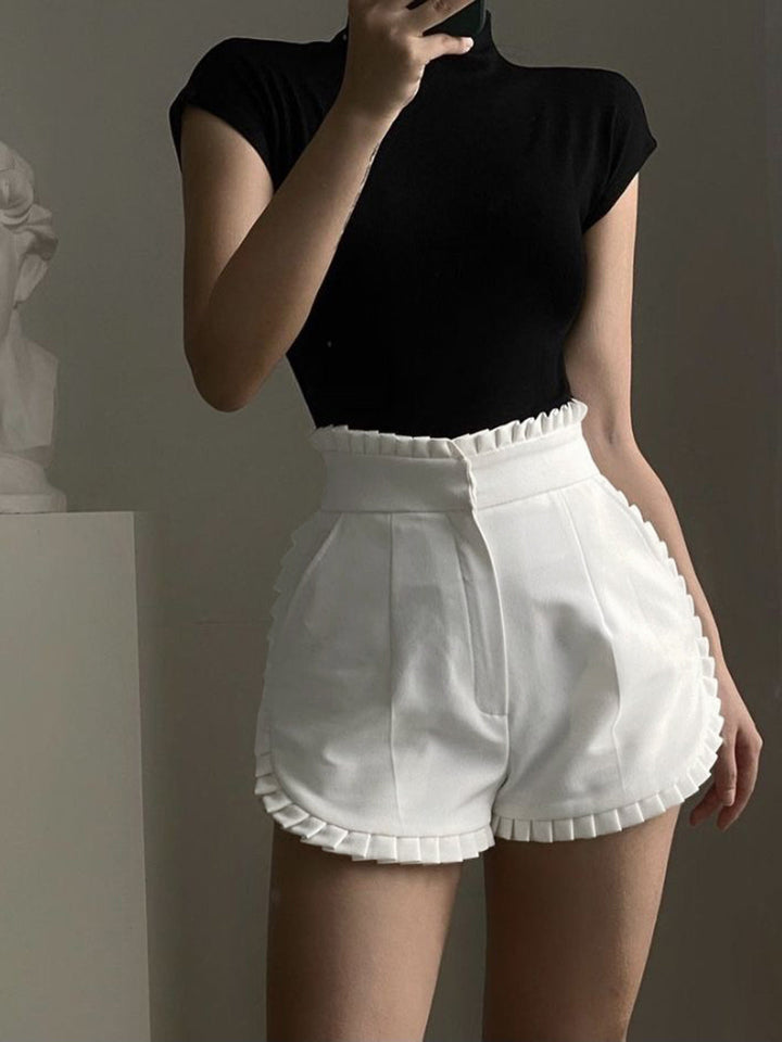 Shorts plissés à volants