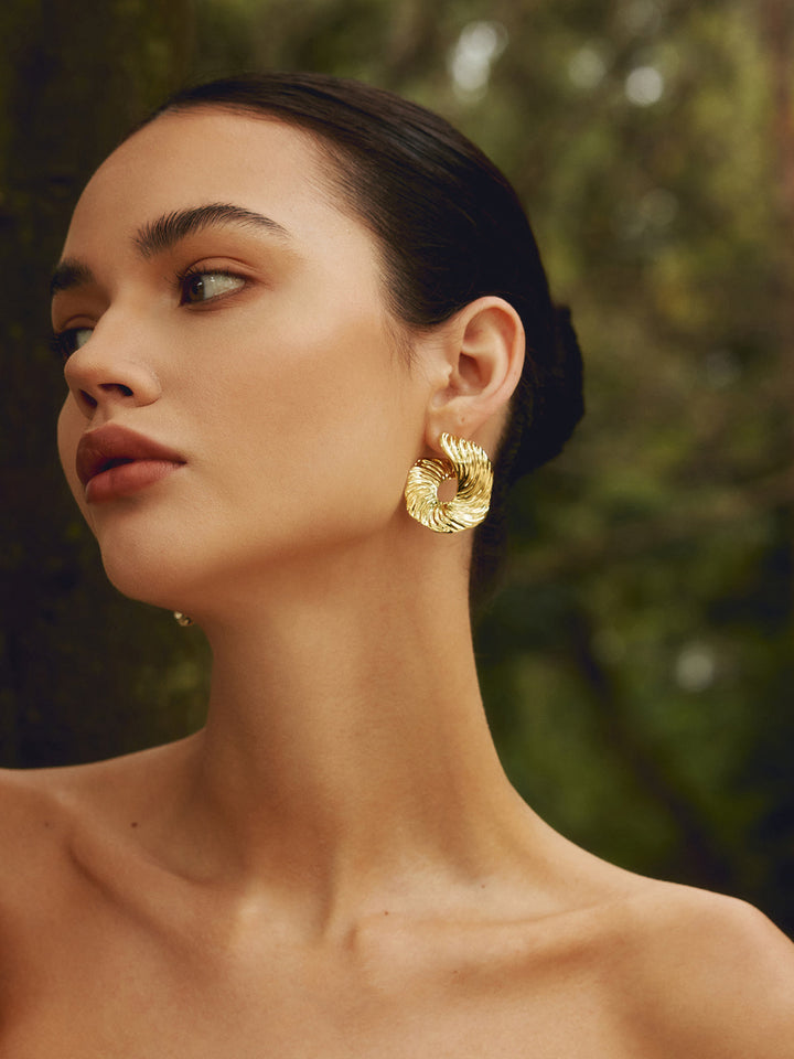 Boucles d'oreilles clous texturées irrégulières géométriques