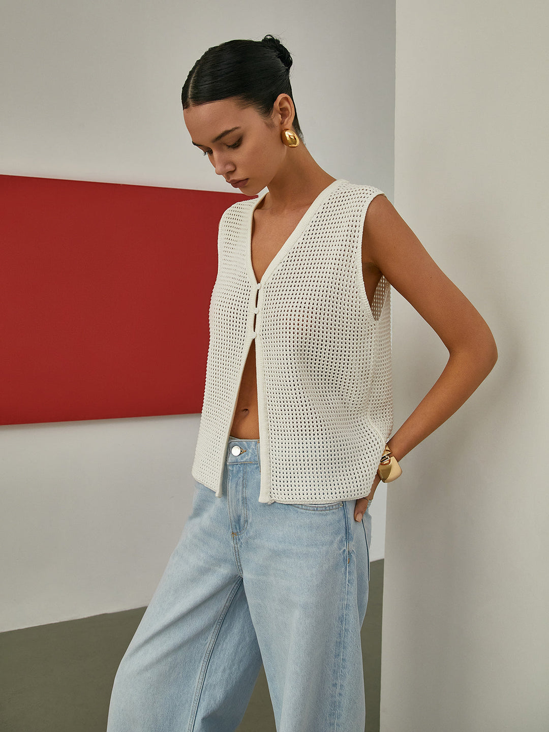 Cardigan en tricot sans manches évidé