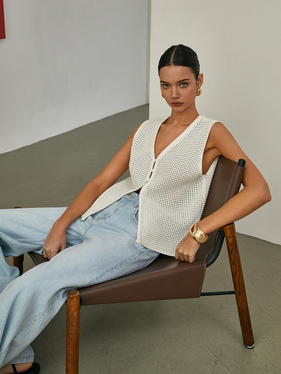 Cardigan en tricot sans manches évidé