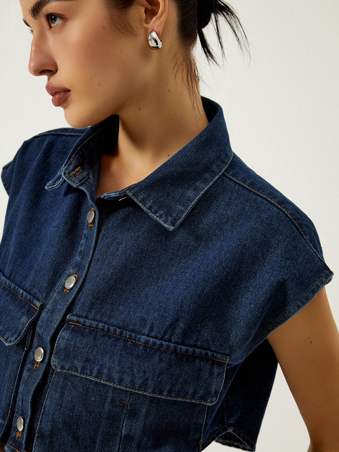 Gilet droit en jean avec col à revers et poches