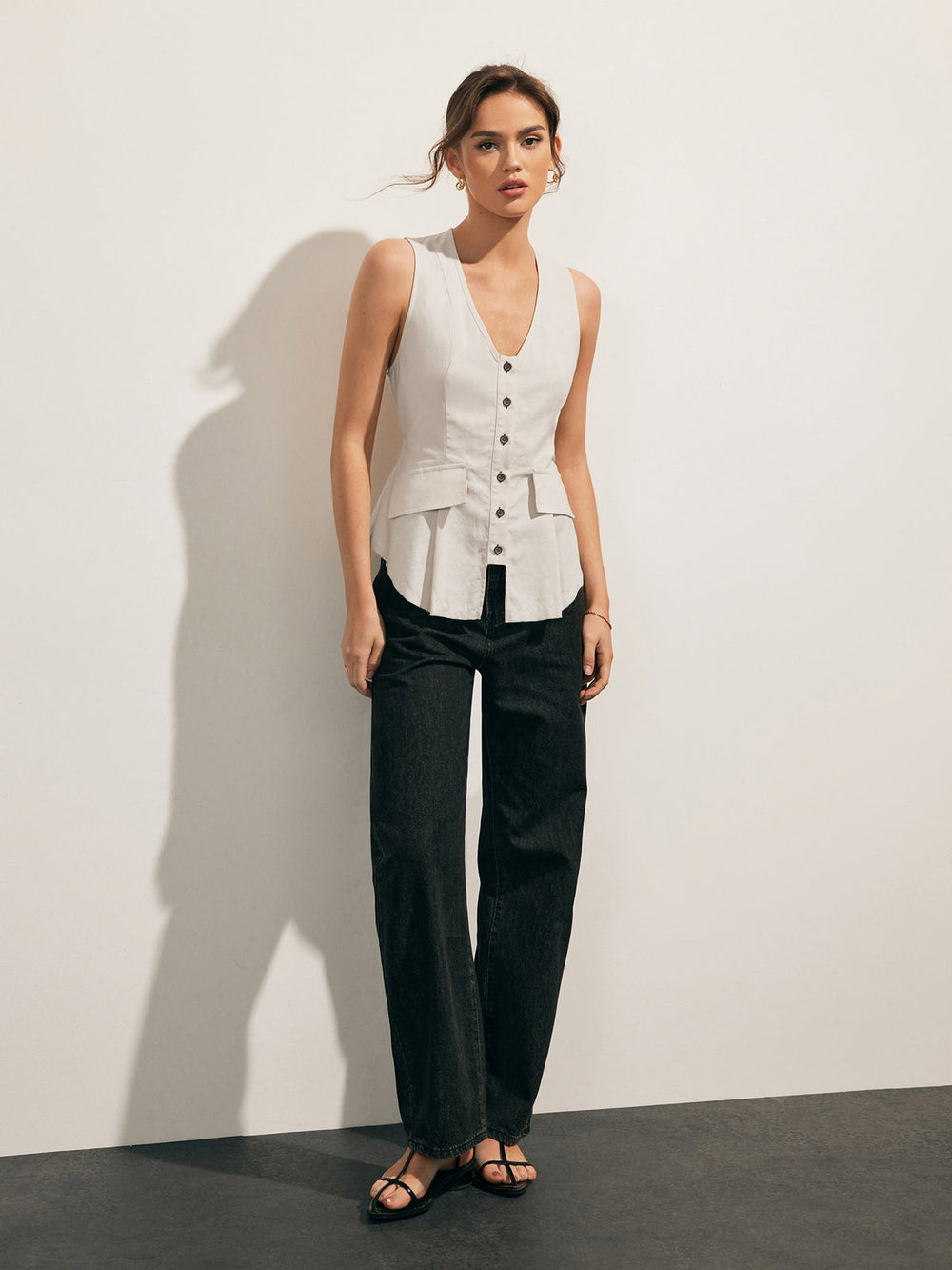 Gilet boutonnée en mélange de lin à ourlet brut