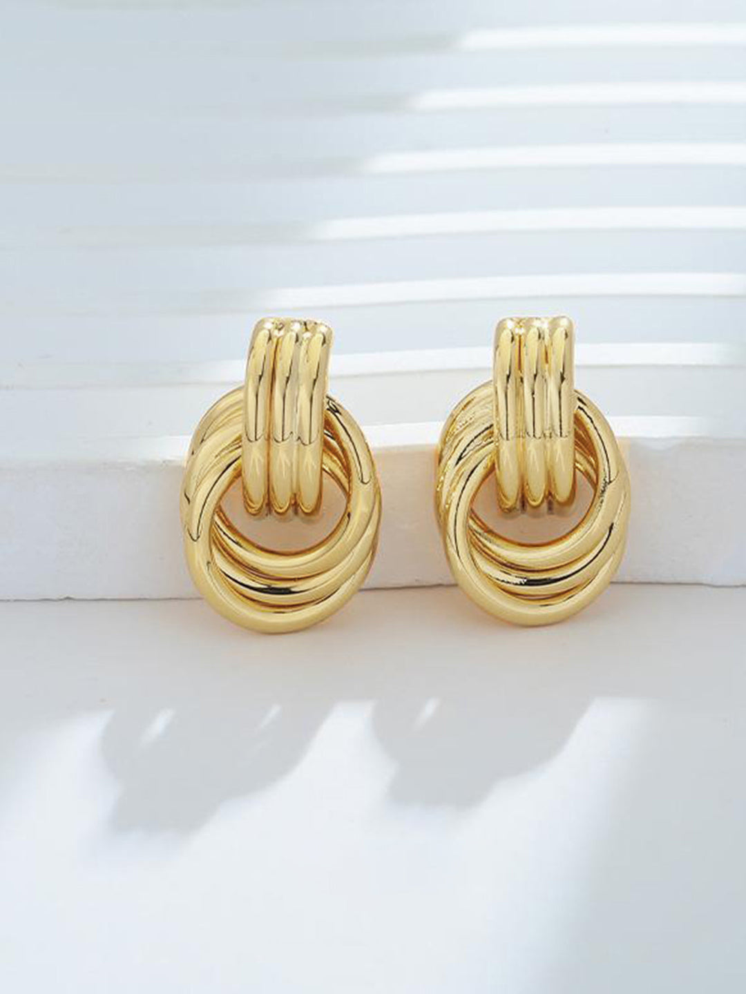Boucles d'oreilles pendantes multi-anneaux dorés