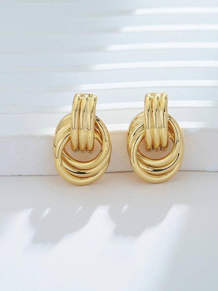 Boucles d'oreilles pendantes multi-anneaux dorés
