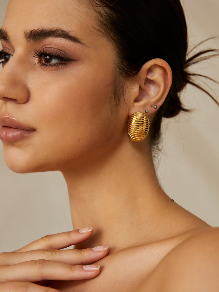 Boucles d'oreilles créoles côtelées dorées