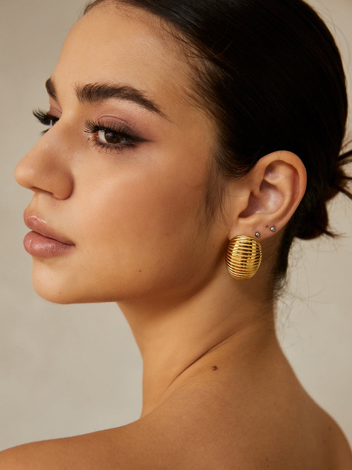 Boucles d'oreilles créoles côtelées dorées