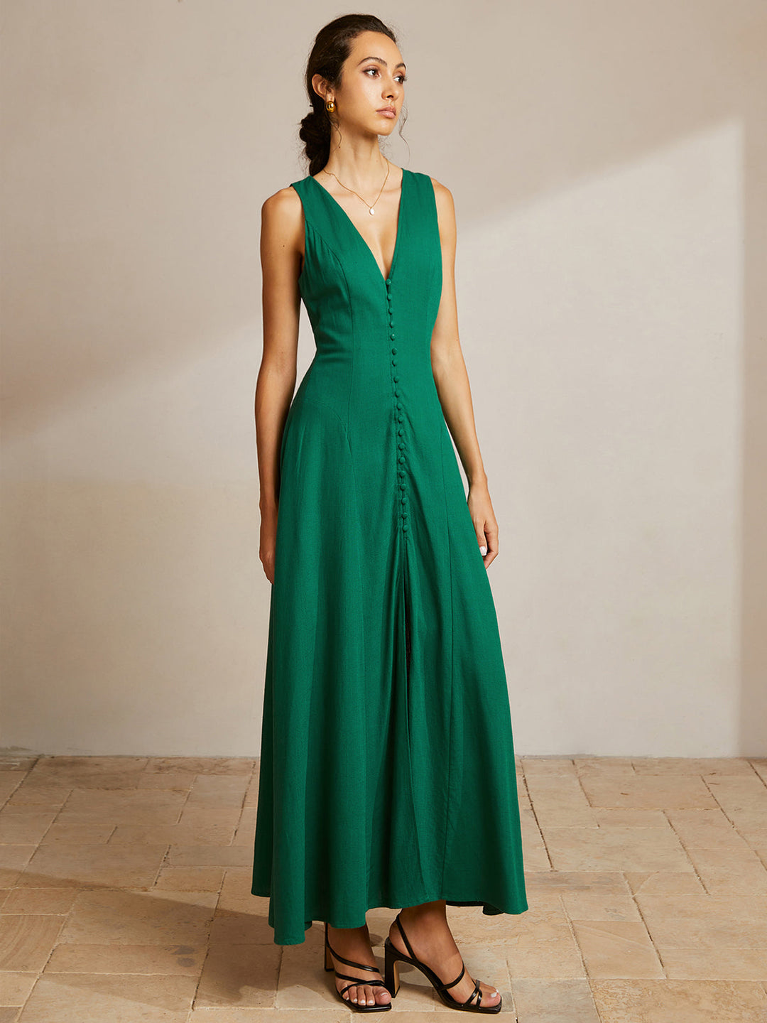 Robe boutonnée sans manches à col en V