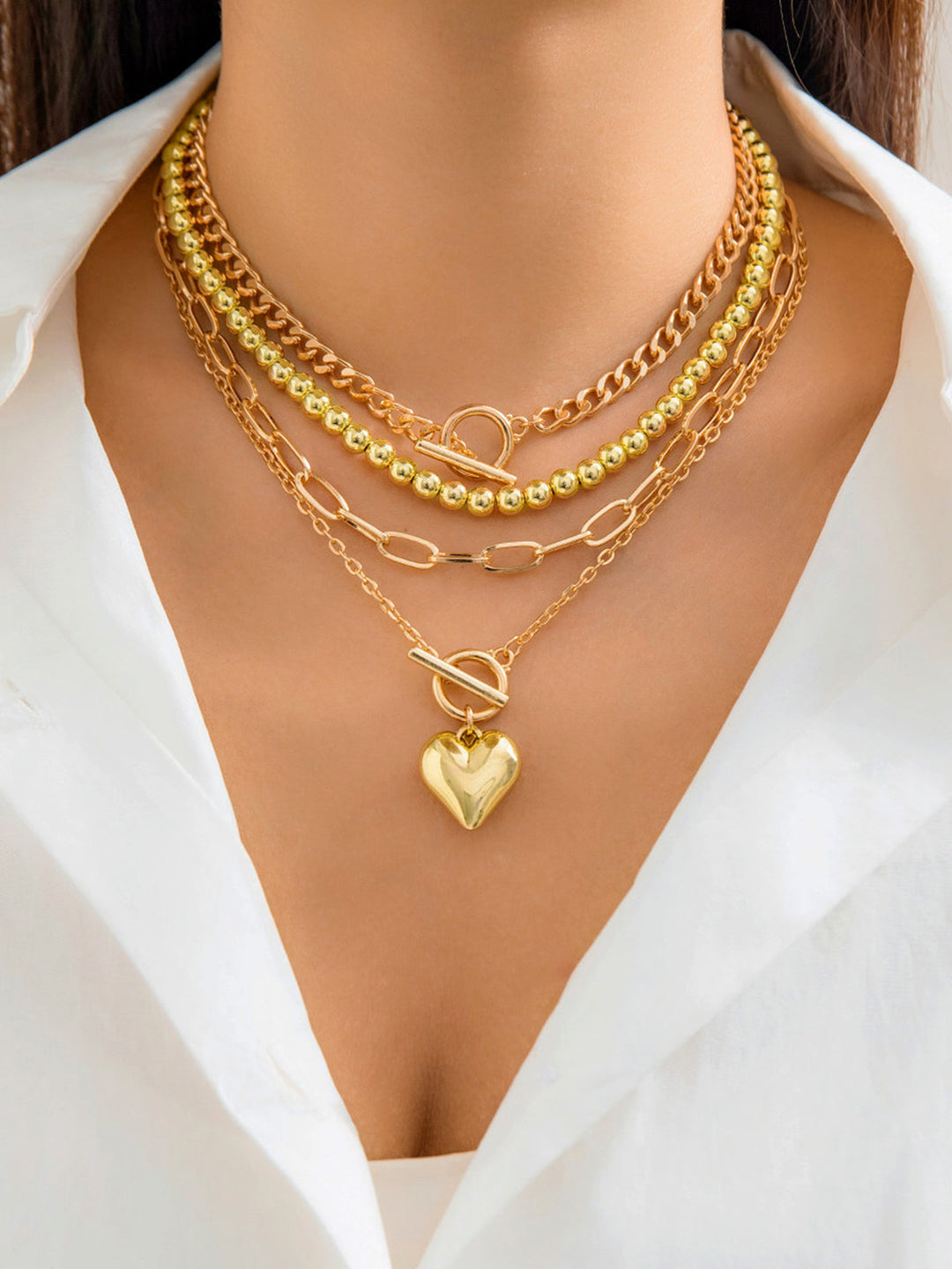 Collier avec pendentif en cœur et chaîne multiple