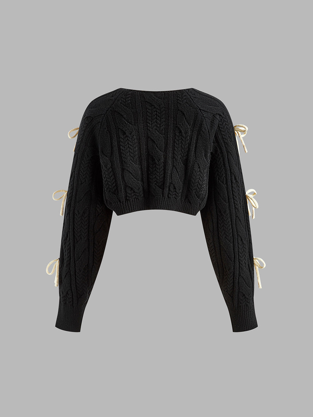 Cardigan en tricot côtelé noué avec un nœud