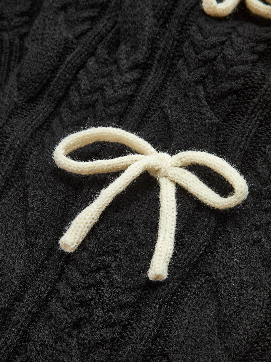 Cardigan en tricot côtelé noué avec un nœud