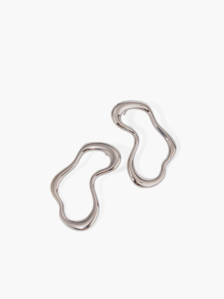 Boucles d'oreilles irrégulières en métal avec clous