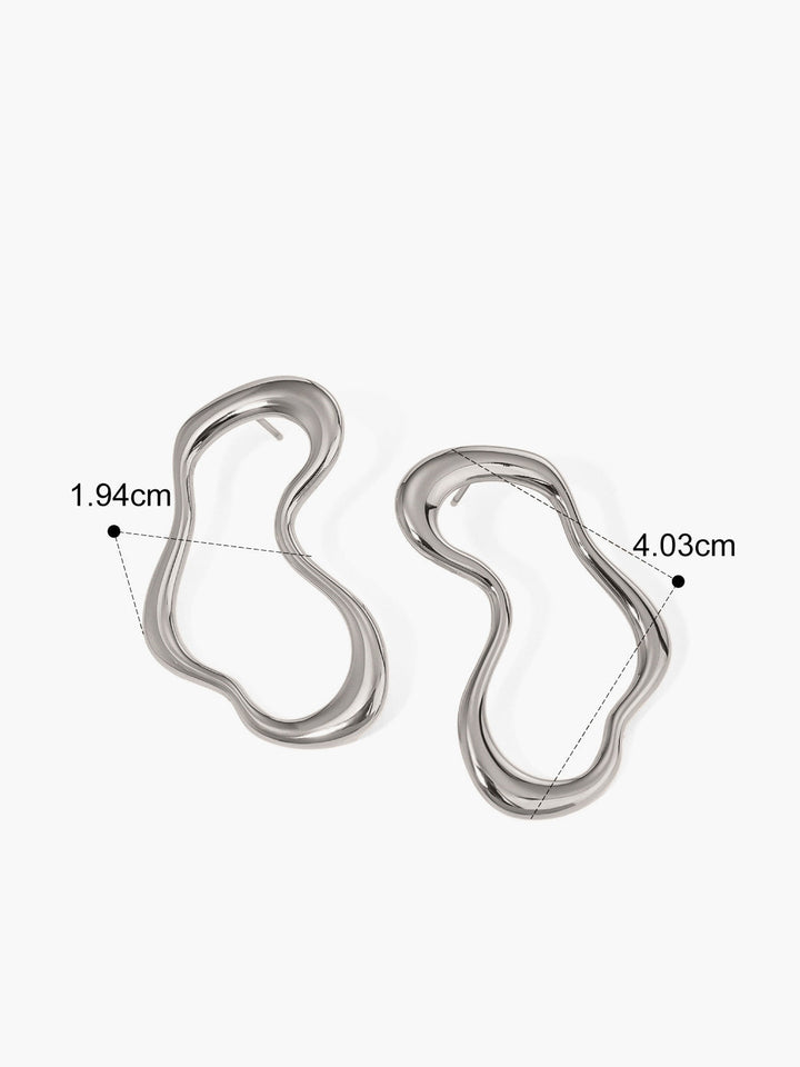 Boucles d'oreilles irrégulières en métal avec clous
