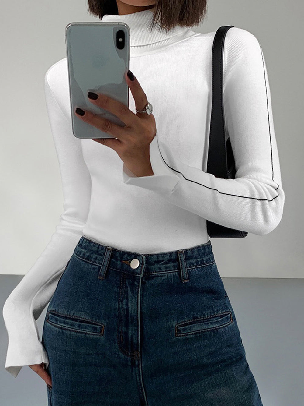 Pull en tricot à col roulé avec passepoil contrastant