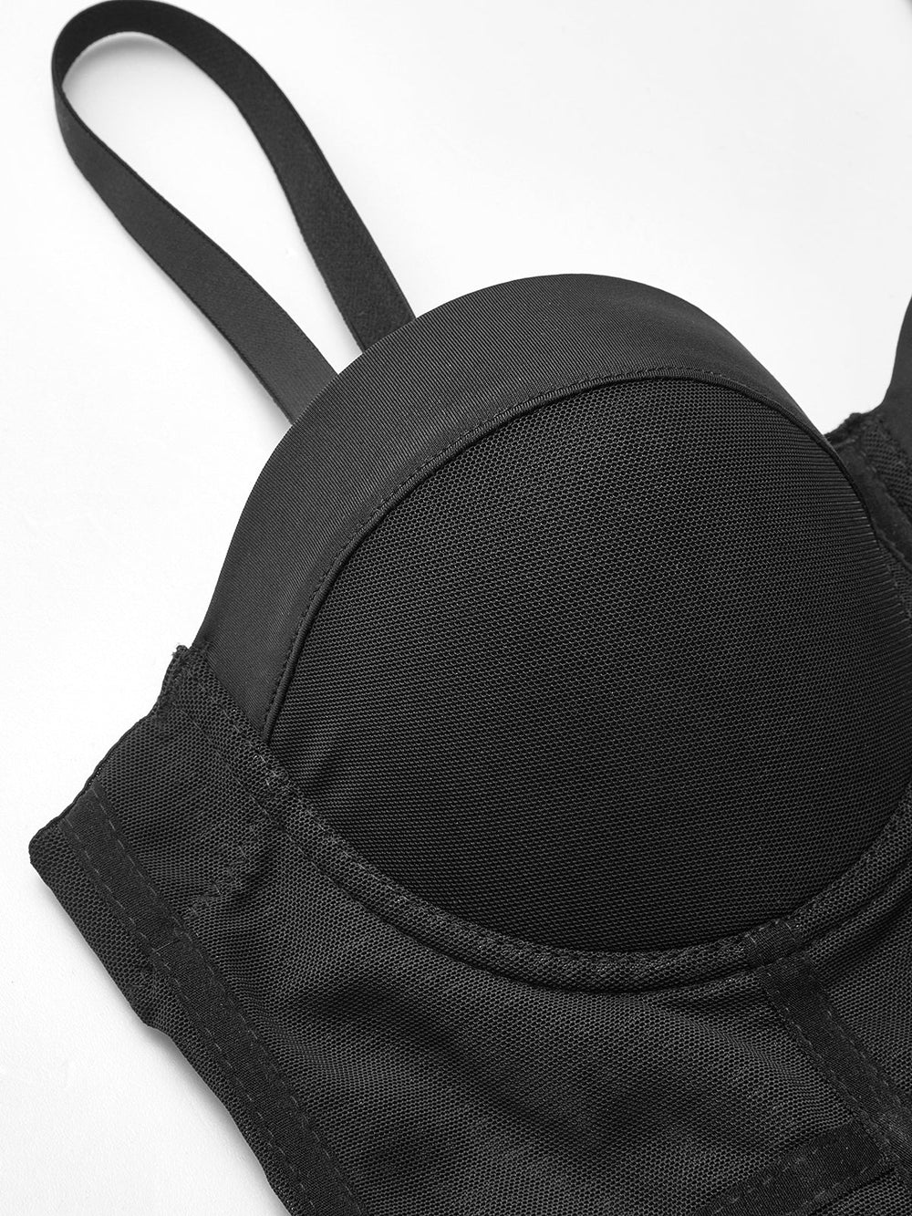 Corset en résille transparente avec passepoil