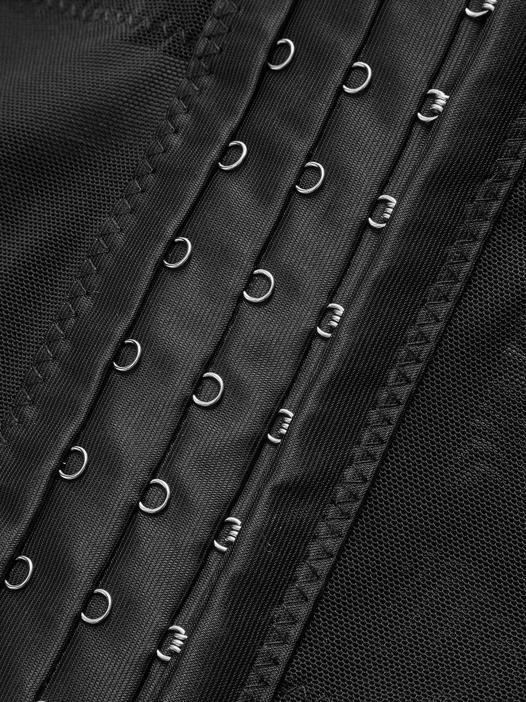 Corset en résille transparente avec passepoil