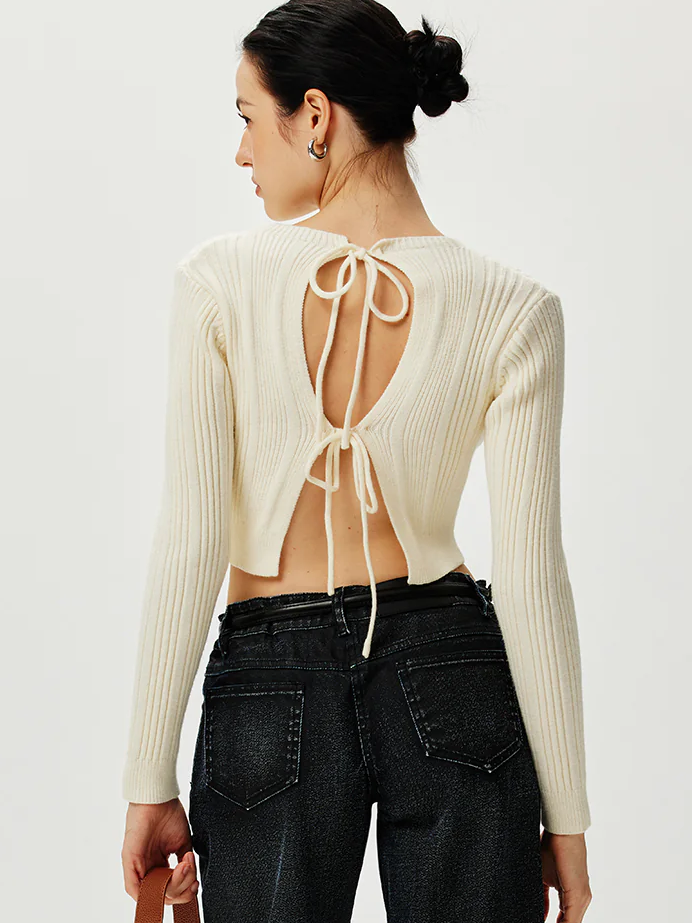 Cardigan en maille à nouer avec découpe