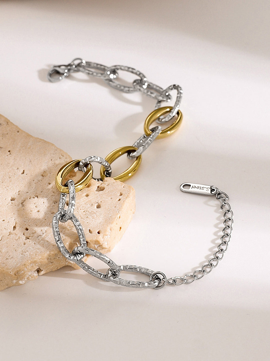 Bracelet à maillons dorés et argentés