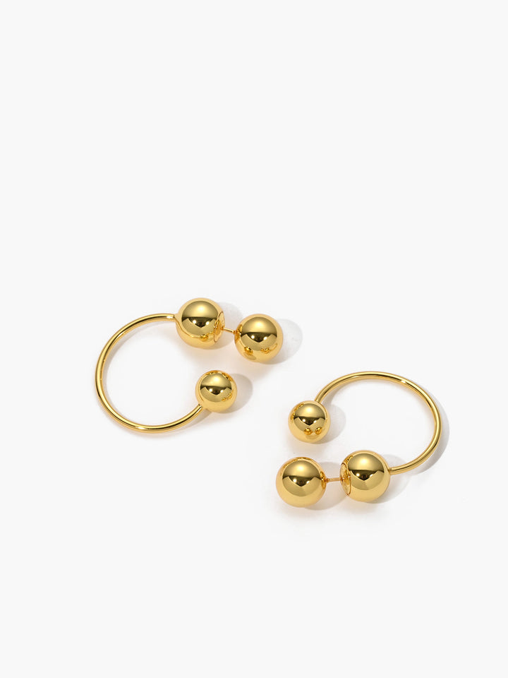 Boucles d'oreilles créoles boule dorées