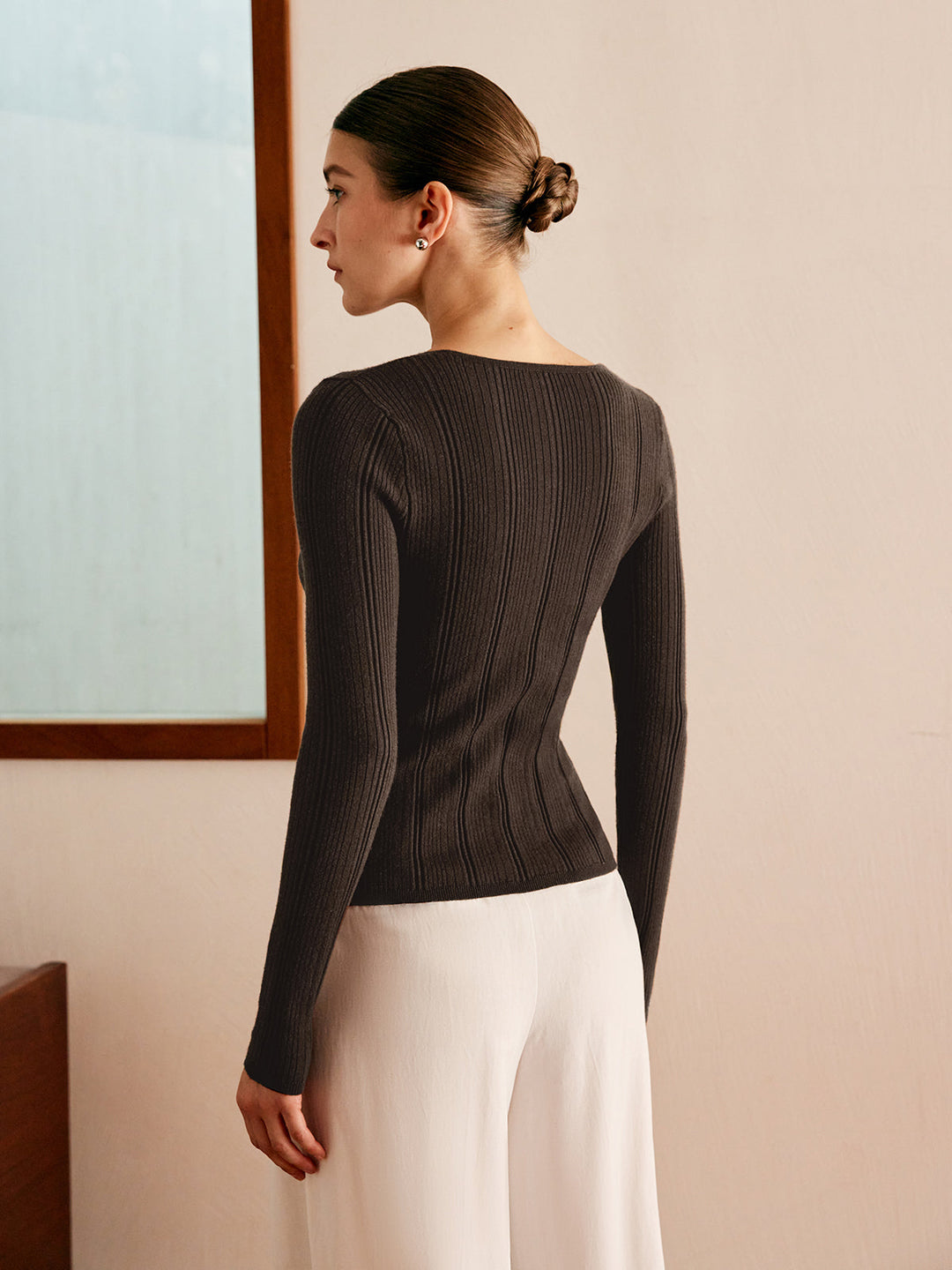 Haut en tricot à bouton découpé