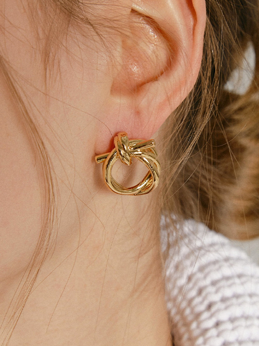 Boucles d'oreilles Nœud Doré