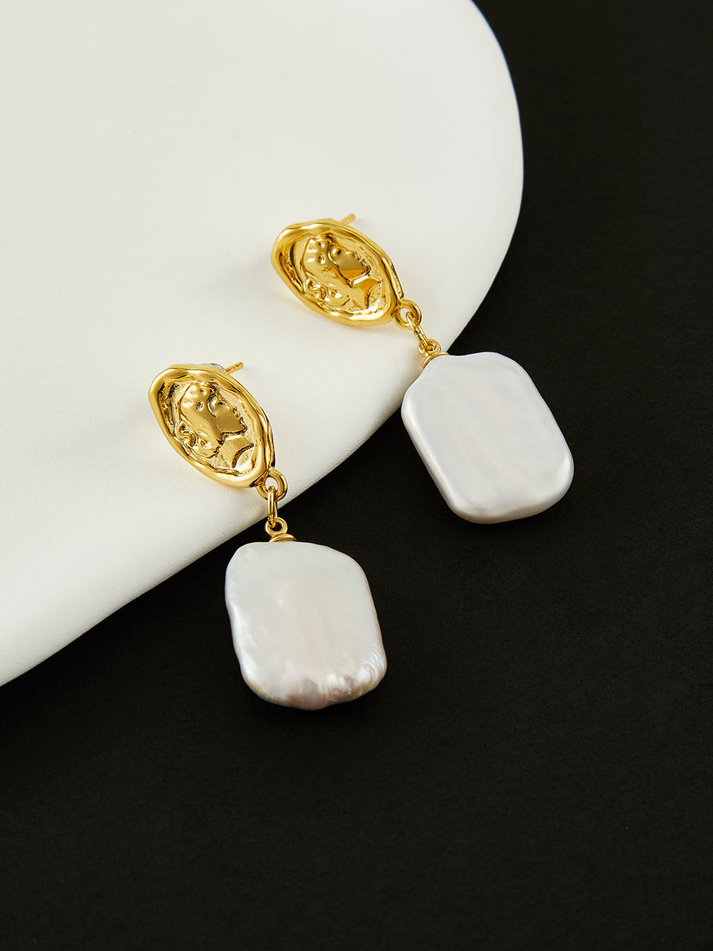 Boucles d'oreilles pendentif en perle baroque