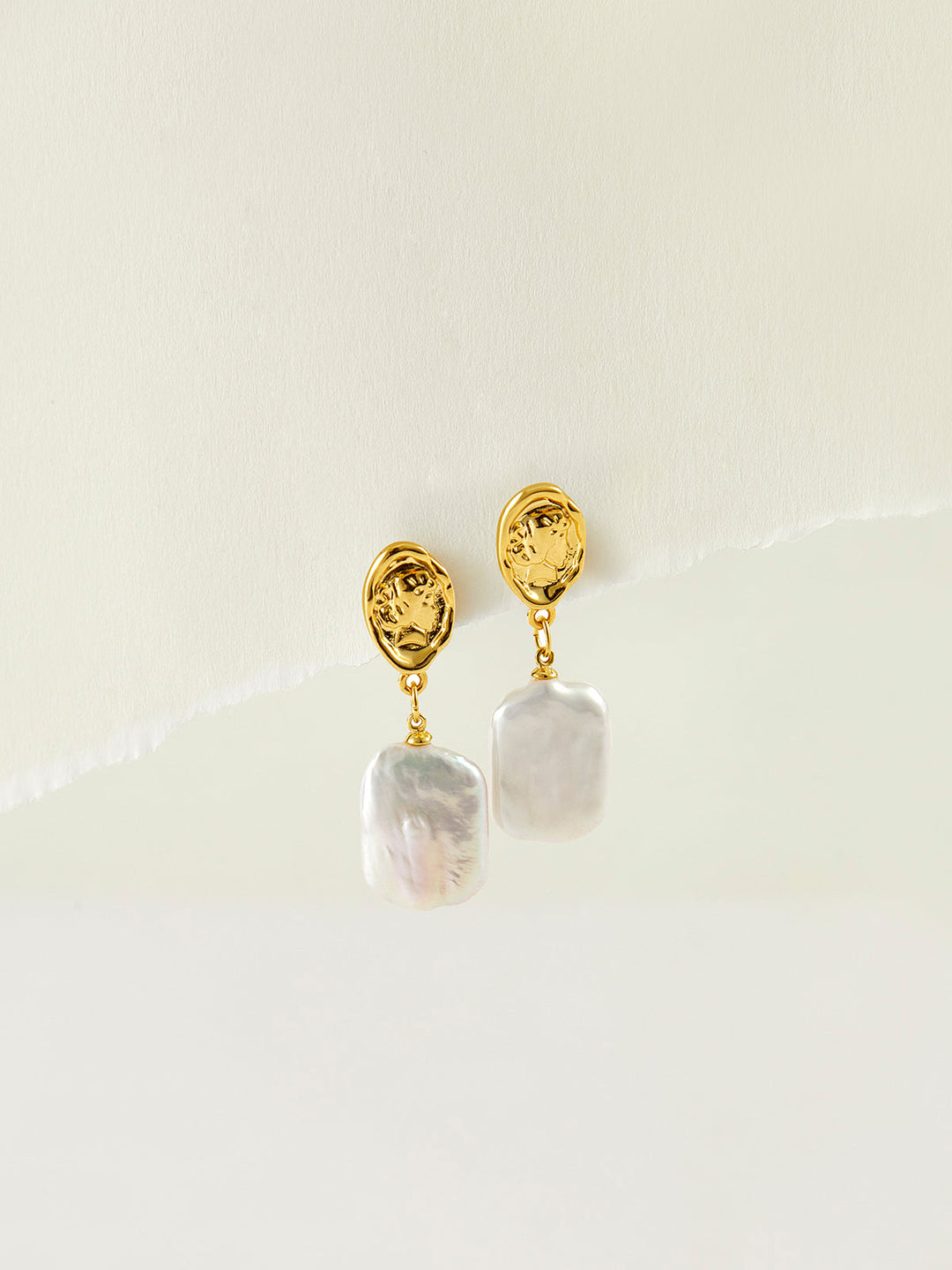 Boucles d'oreilles pendentif en perle baroque