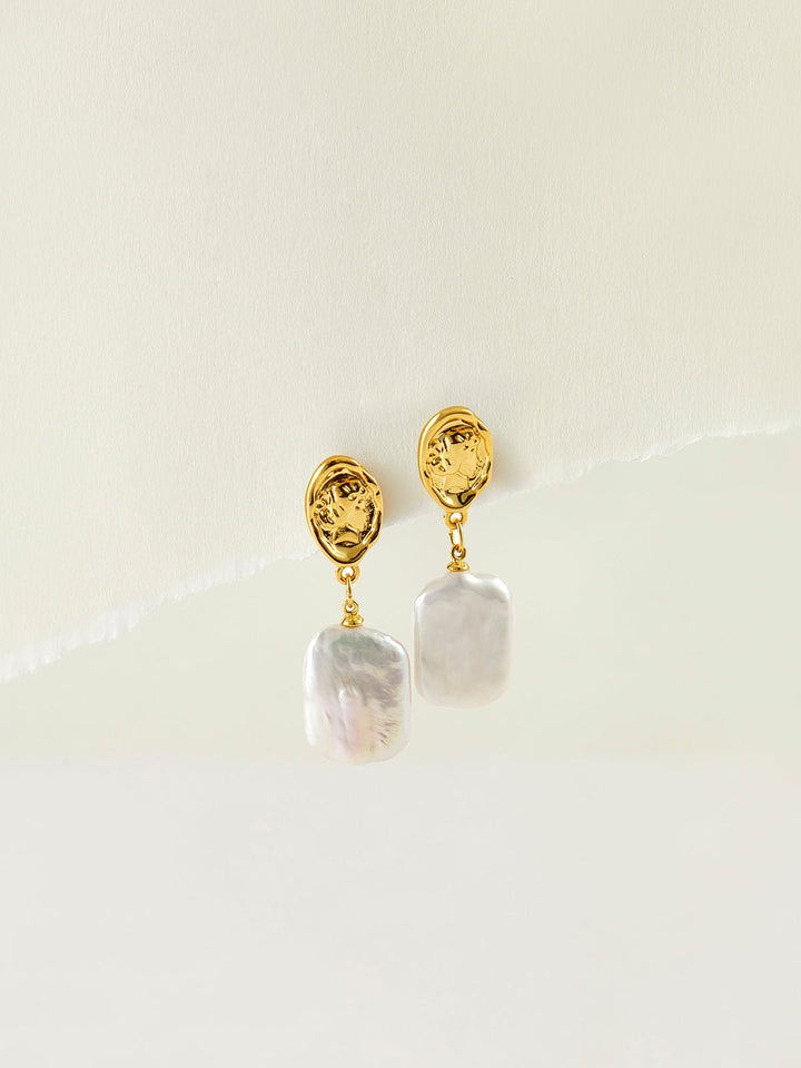 Boucles d'oreilles pendentif en perle baroque
