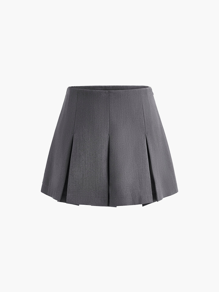 Jupe mini zippée plissée