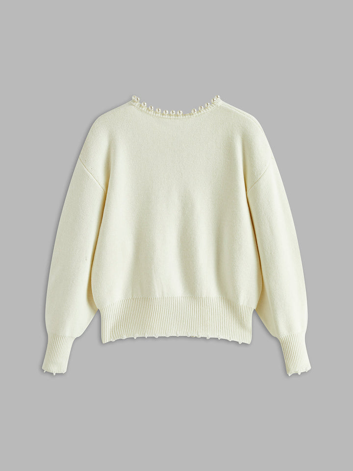Cardigan à ourlet déchiré avec garniture en perles