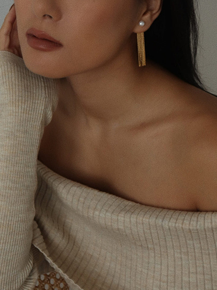 Boucles d'oreilles perles à pompon doré