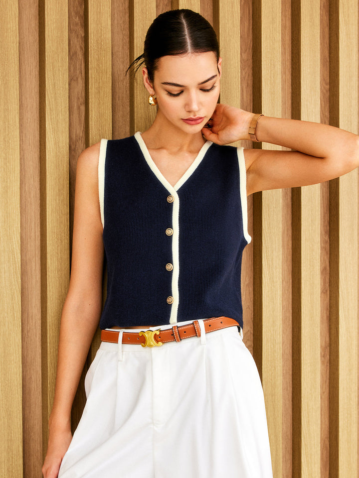 Gilet sans manches à boutons dorés et bordure contrastante
