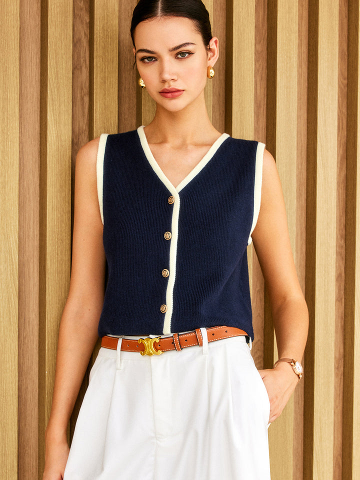 Gilet sans manches à boutons dorés et bordure contrastante